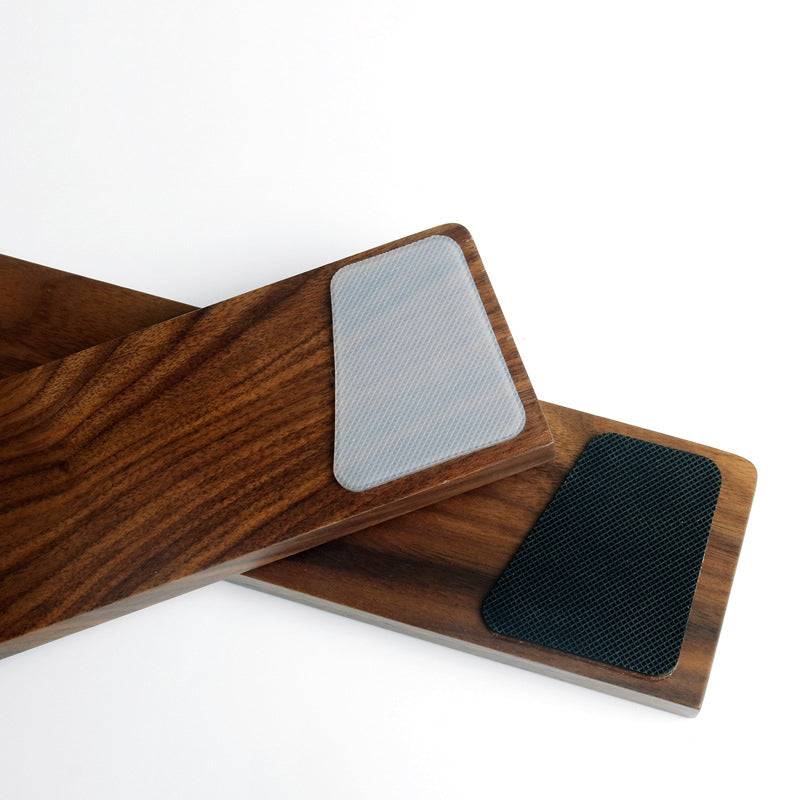 Ergora Walnut Wrist Rest in front of a mechanical keyboard