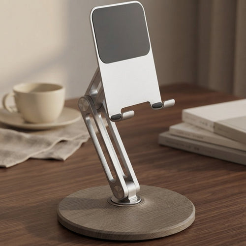 Ergora Altus folding phone and tablet stand, silver aluminium arm on a warm grey-brown wood-grain base